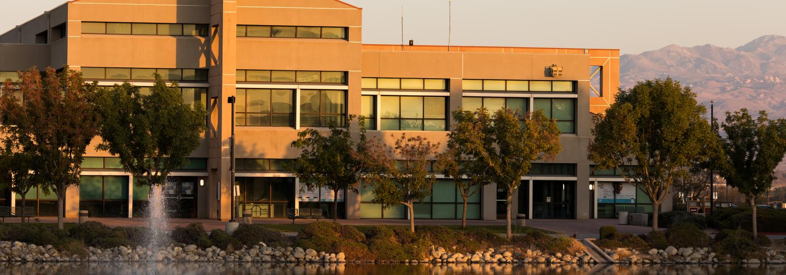 Campus view of lake and building